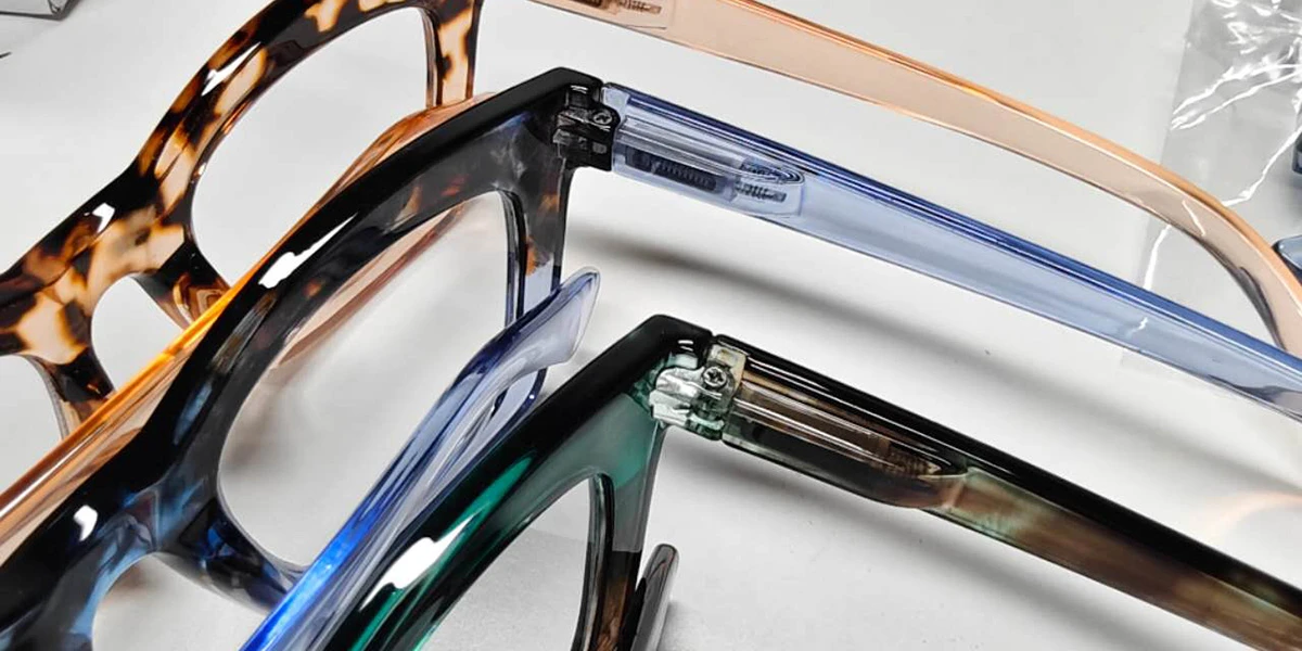 Acetate eyewear samples in four colorways with hinge and temple detail visible