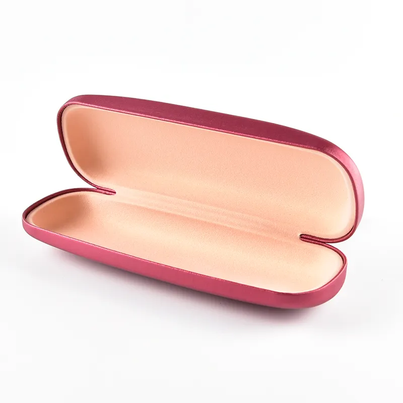 Open hard shell eyeglass case in rose finish with soft satin-lined interior