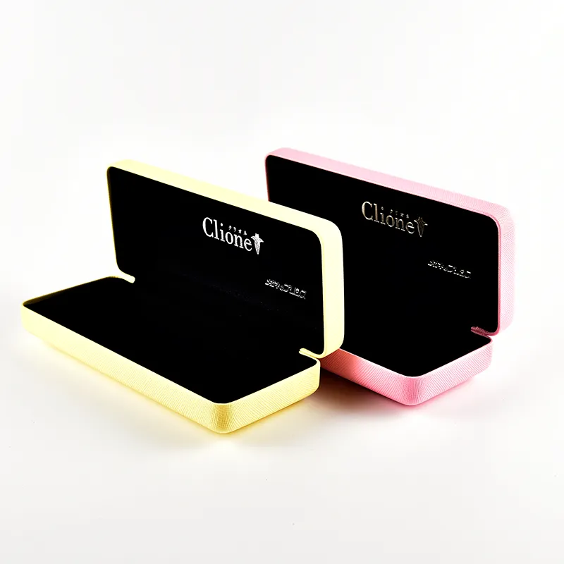 Open saffiano eyeglass cases with black velvet lining and custom inside logo — OEM branding example