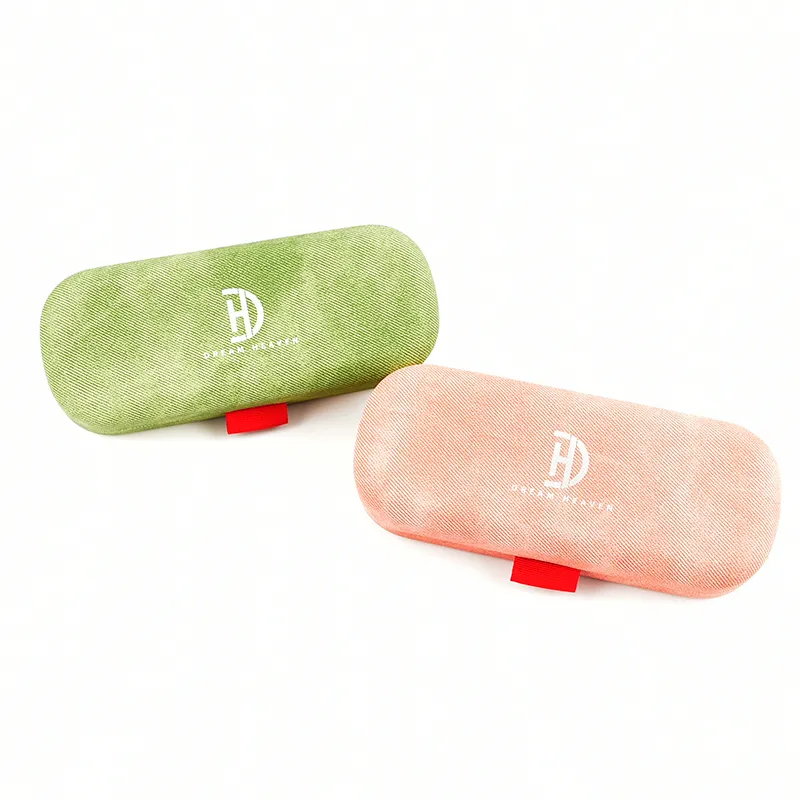 OEM hard shell eyeglass cases in green and pink fabric finish with custom screen-printed logo