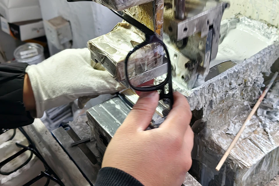 workers put custom logo on inside of temple.