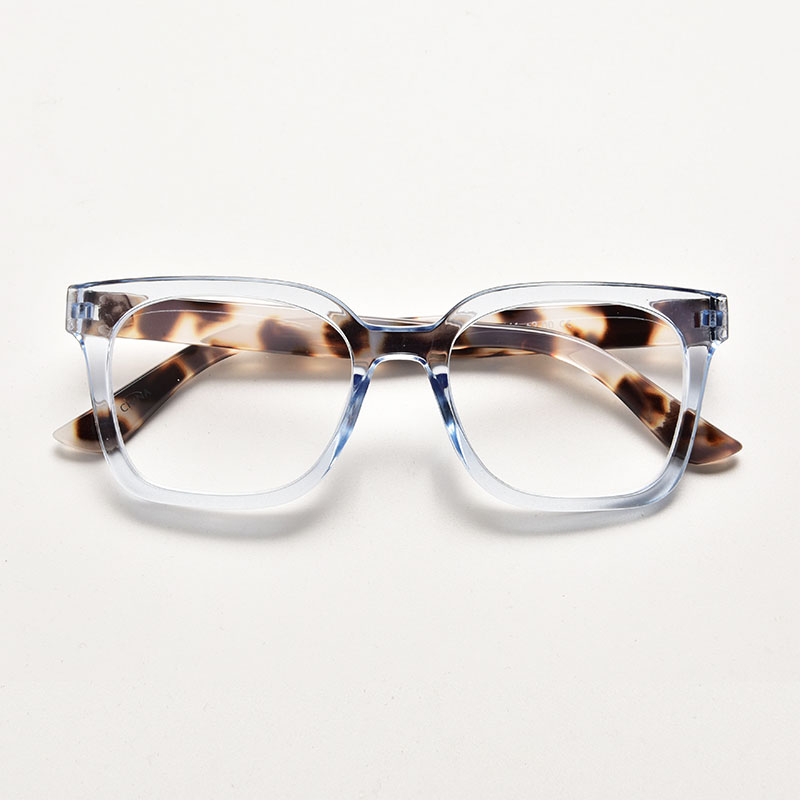 Transparent crystal blue square reading glasses featuring contrasting brown tortoiseshell arms and stylish thick frames.