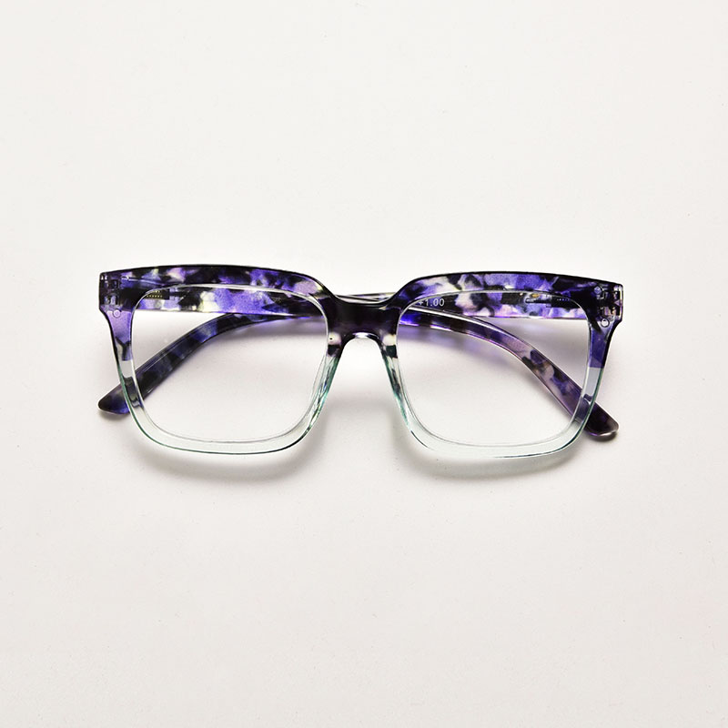 Gradient square reading glasses featuring a purple tortoiseshell upper rim fading into a transparent teal green lower rim.