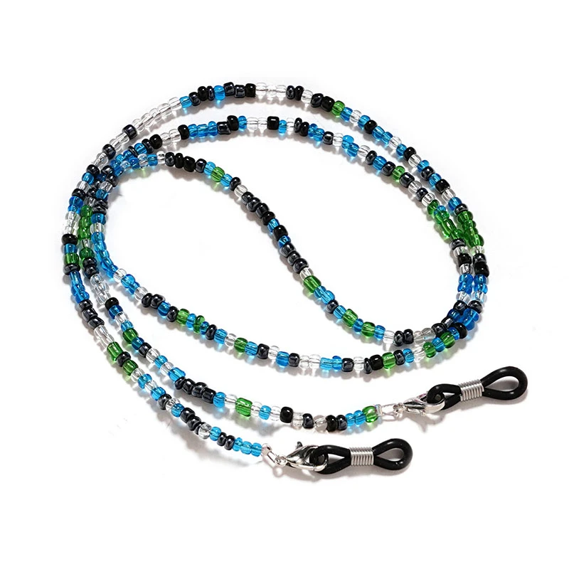 Wholesale beaded eyewear retainer in shades of purple, pink, and clear crystal. The chain is displayed with its secure clasps and adjustable loops for holding glasses.