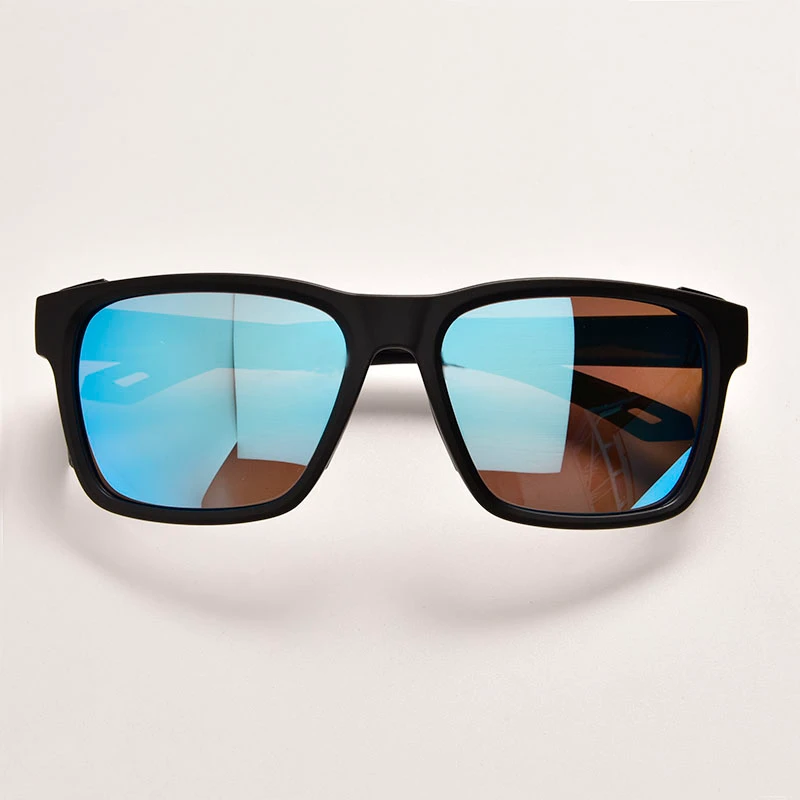 Interior view of matte black fishing sunglasses with side shields. Features anti-slip textured rims and lanyard holes for secure fit.