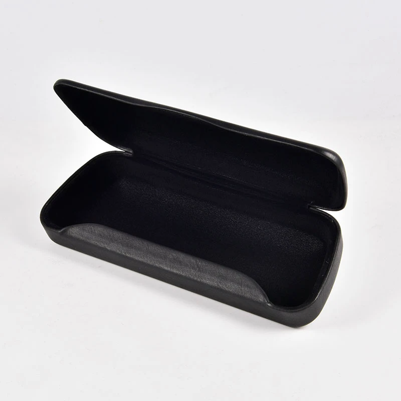 The interior view of the open triangular foldable case, showing the soft, black protective lining.