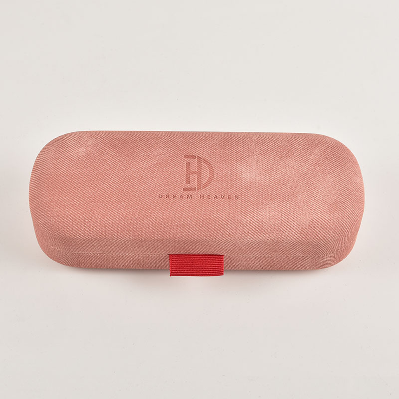 The soft protective interior of a pink, linen-style hardshell glasses case, ready for custom logo application for brands and OEM projects.
