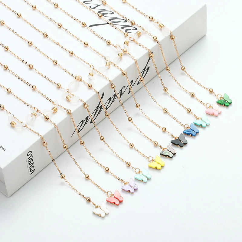 Collection colors of eye glasses string holder straps with butterfly charms, suitable for fashion boutiques and eyewear brand customization.
