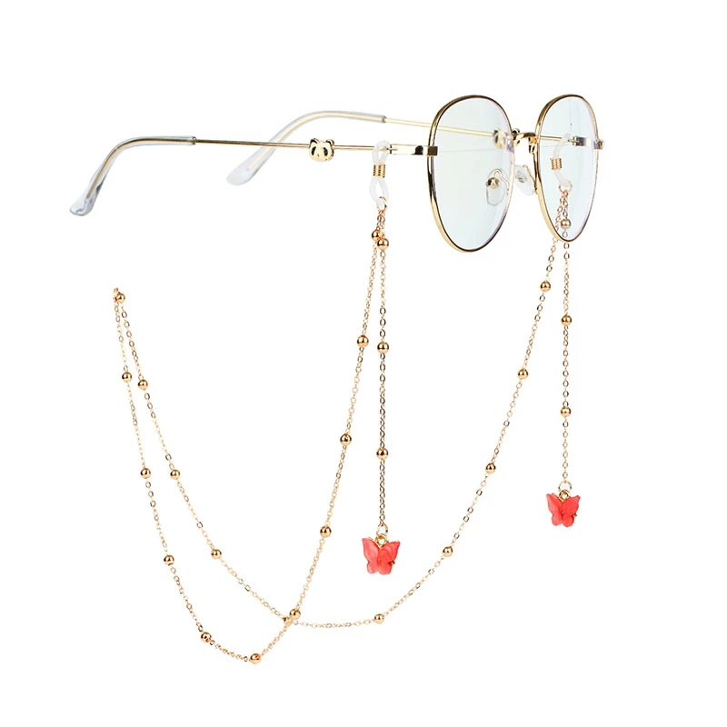 Fashion eye glasses string holder strap with red acrylic butterfly charm and gold metal bead chain for women's eyewear accessories wholesale.
