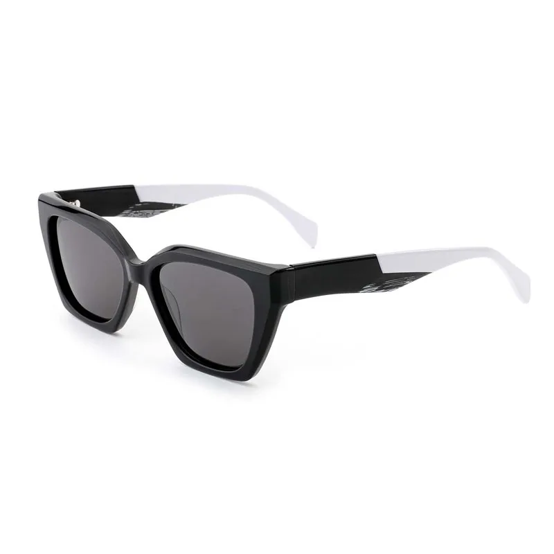 A pair of classic black custom laminated acetate sunglasses.