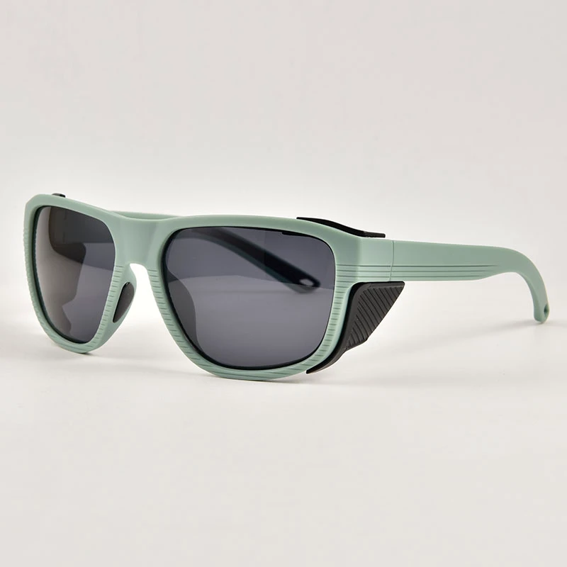 Side profile showing integrated black blockers on green side protection sunglasses. Windproof and dust-proof design suitable for fishing and mountaineering. OEM customization available.