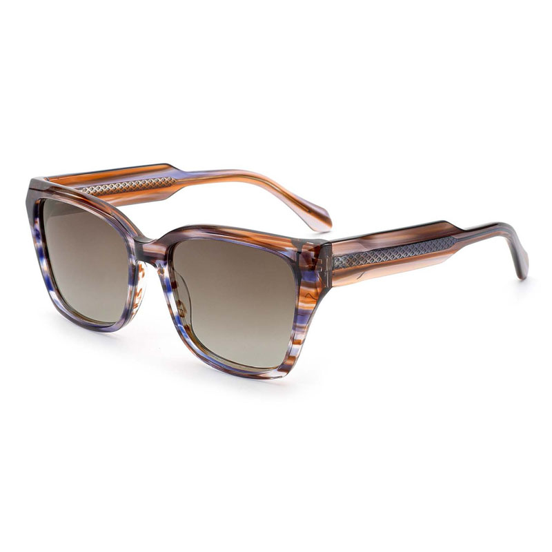 Women's designer acetate sunglasses in a multi-color striped acetate, showcasing the wide temple design. Offered by a wholesale acetate frame sunglasses factory.