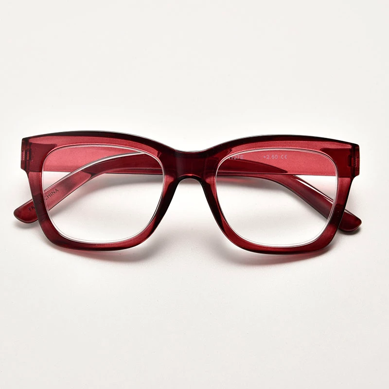Translucent burgundy crystal eyewear frames from a direct reading glasses manufacturer. Features a modern acetate-look design with wide temples, perfect for custom private label logo printing.