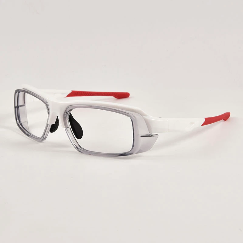 White frame sports safety glasses with red rubber temples and integrated side shields. High-impact protective eyewear factory for wholesale.