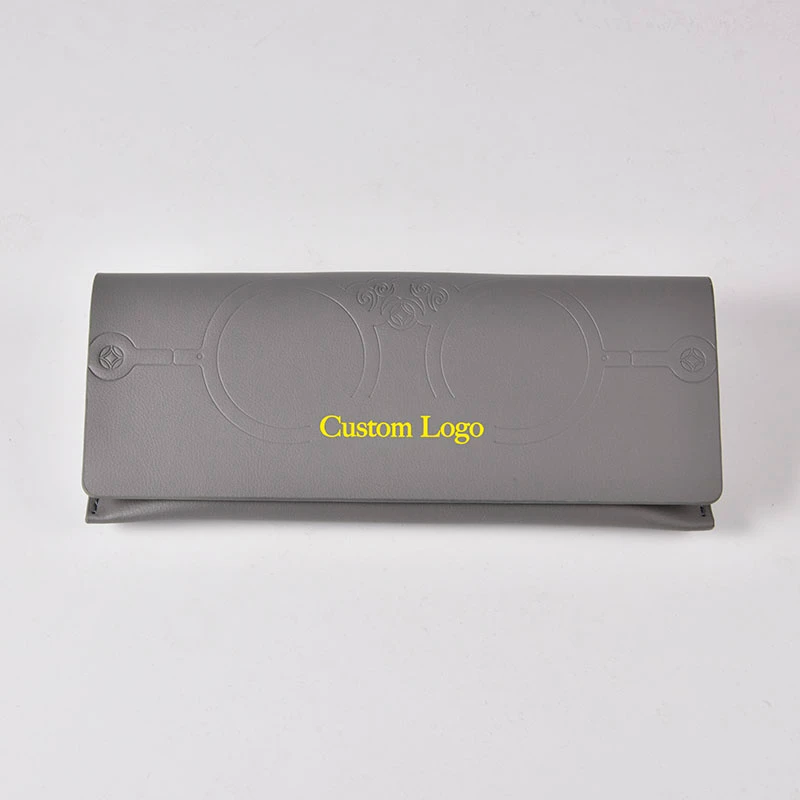 a grey color eyeglasses case with printed custom logo on middle.