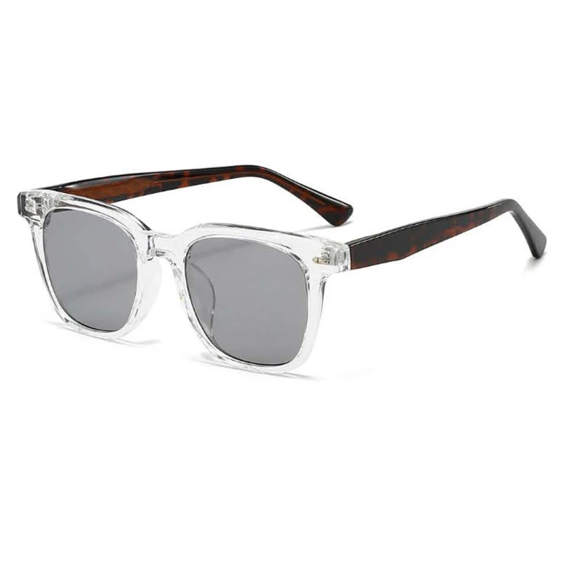 a fashion unisex sunglasses with a modern crystal clear frame and tortoiseshell temple.