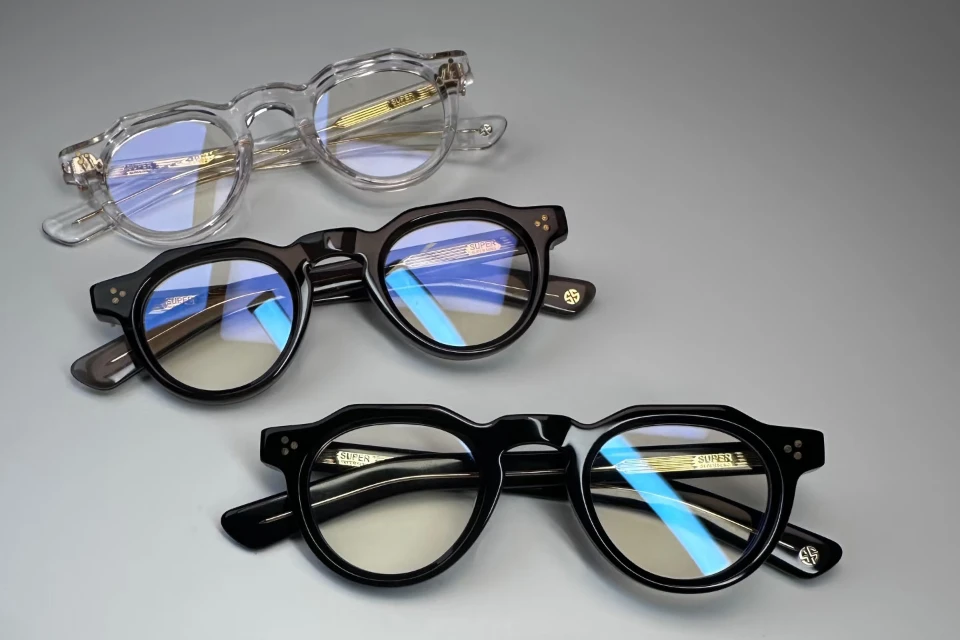 a collection of retro acetate glasses