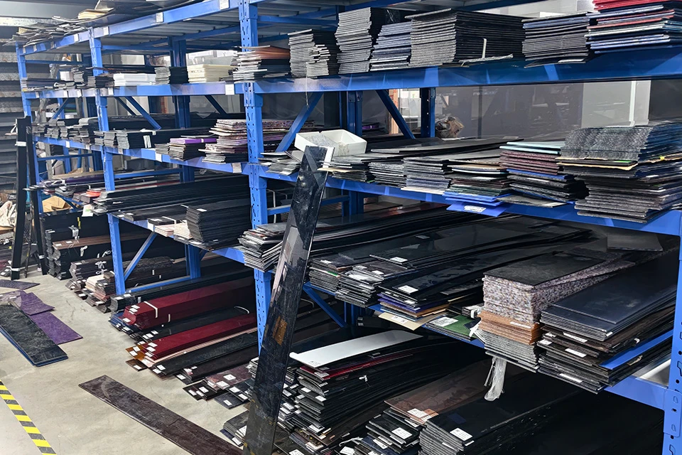 Acetate sheet inventory at Vistalumo factory showing materials from acetate supplier