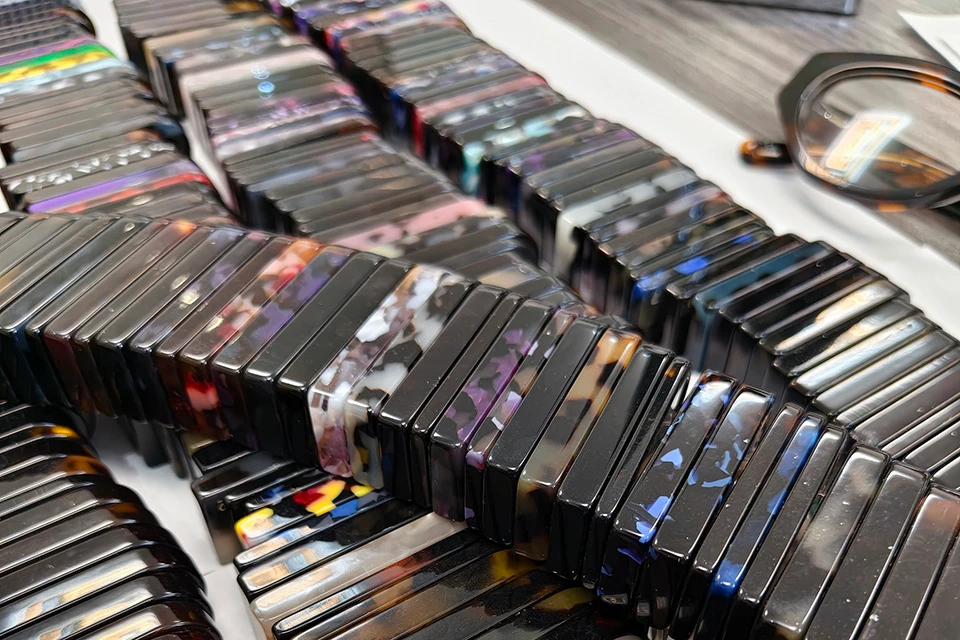 Chinese acetate sheets in various colors and patterns showing wide selection for eyewear production